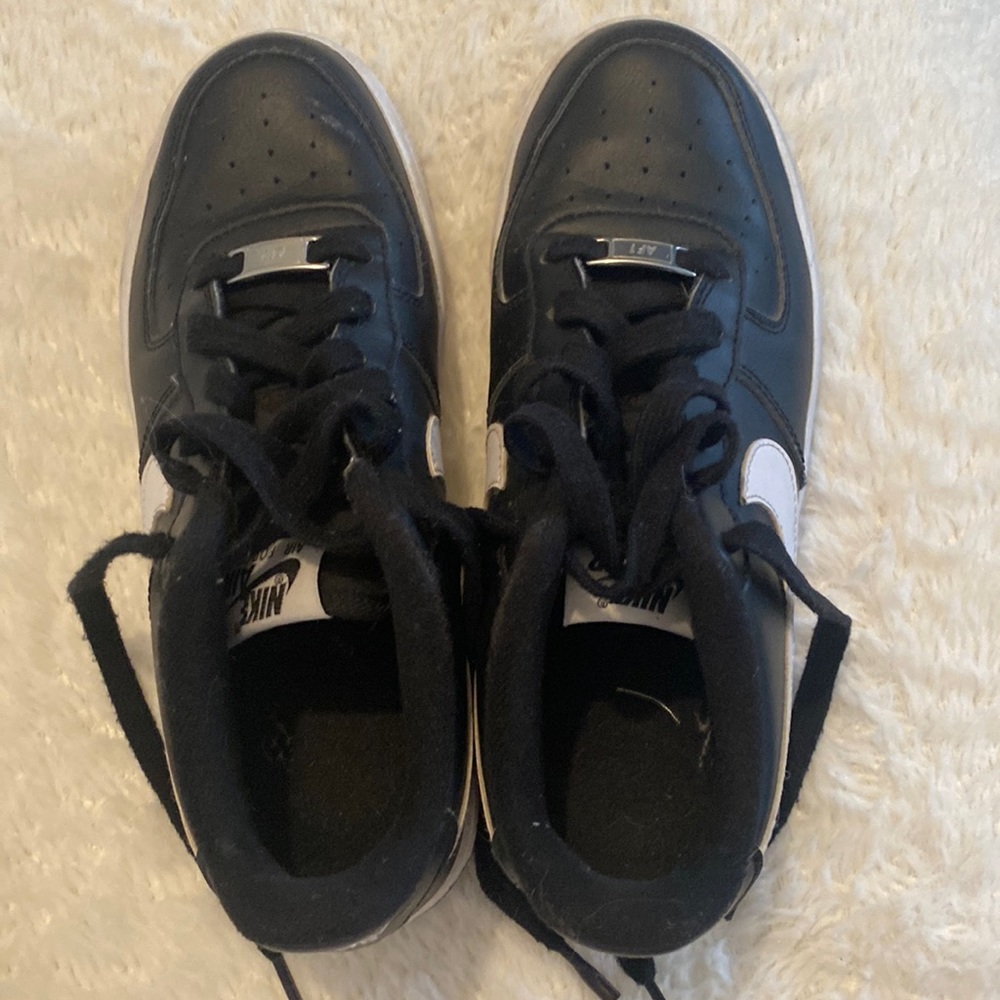 Black and white Nike Air Force ones size youth 5.5